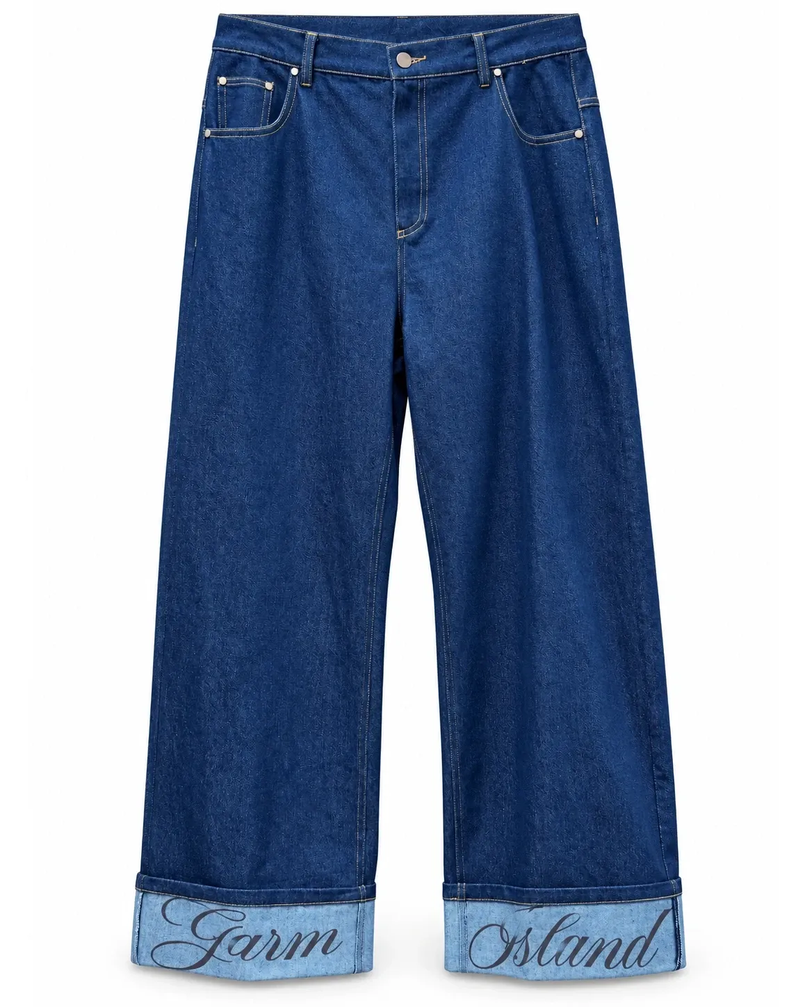 Dark indigo wide-leg jeans with turned-up cuffs showing printed script lettering, on a white background